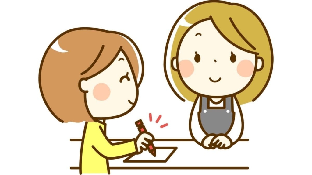 サービスカウンターで申し込みをする女性客