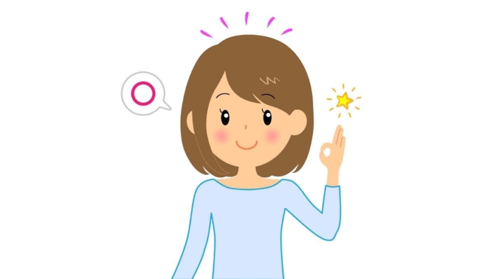 OKサインを出す女性